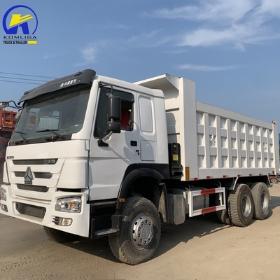 Caminhão de descarga pesado usado de 8X4 de 60 toneladas Sinotruk em boas condições com pneus radiais de 1200r20