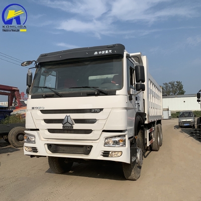 Caminhão de descarga pesado usado de 8X4 de 60 toneladas Sinotruk em boas condições com pneus radiais de 1200r20