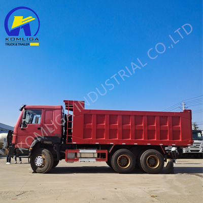 Caminhão de descarga usado Sinotruk HOWO com levantamento hidráulico de rebentador ventral em boas condições