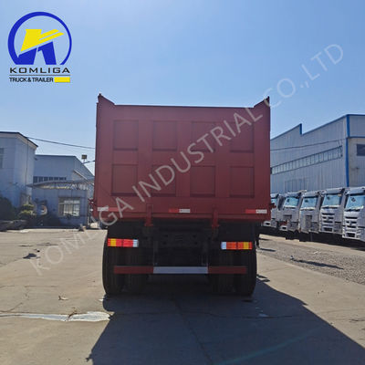 Caminhão de descarga usado Sinotruk HOWO com levantamento hidráulico de rebentador ventral em boas condições