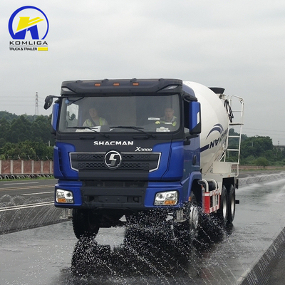 Shacman 6X4 caminhão de mistura de concreto com desempenho e levantamento hidráulico de rebentador ventral
