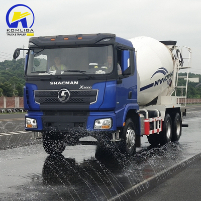 Shacman 6X4 caminhão de mistura de concreto com desempenho e levantamento hidráulico de rebentador ventral
