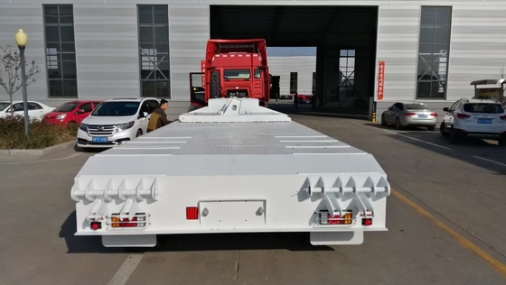 2-5 eixos Sinotruk Semi-reboque de cama baixa com trem de pouso 30-100t Capacidade 12 Pneus